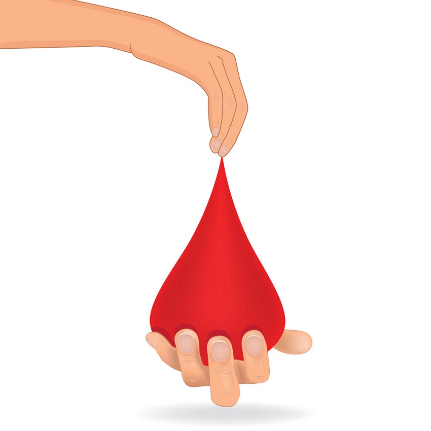 hand holding blood drop