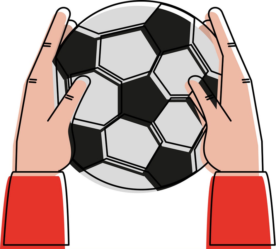 hand holding soccer ball
