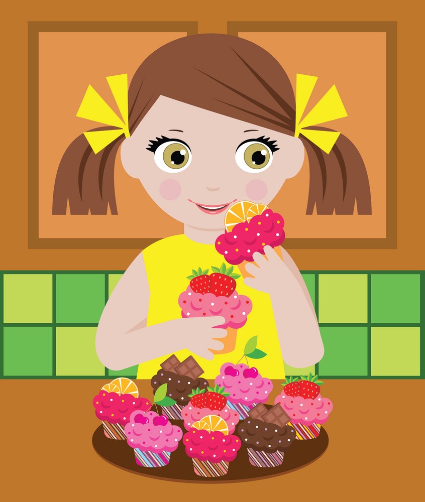 little girl eating cupcakes