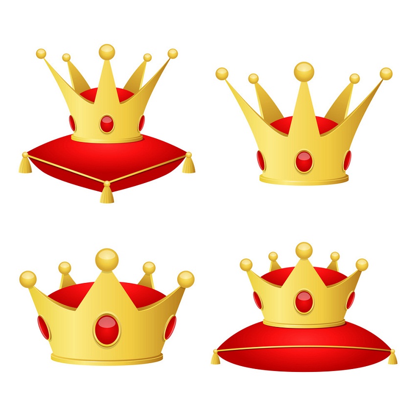 set of golden crown on pillow