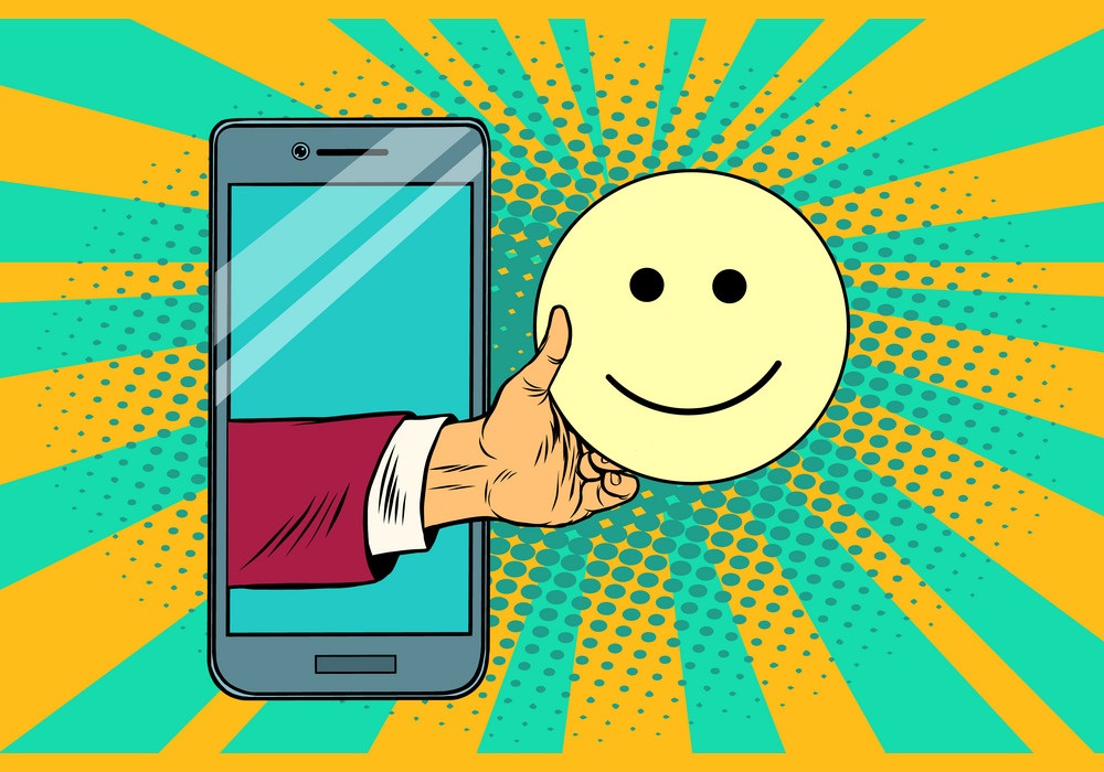 smile joy emoji on smartphone