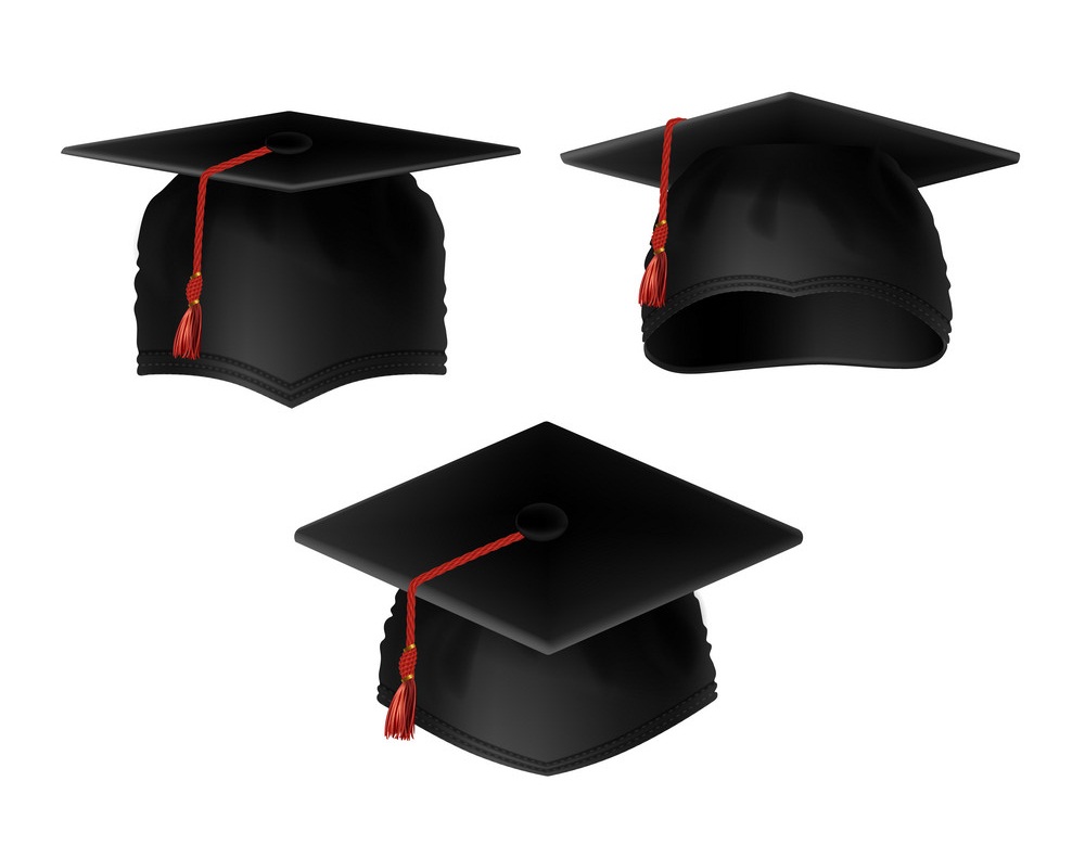 three graduation caps with red tassels