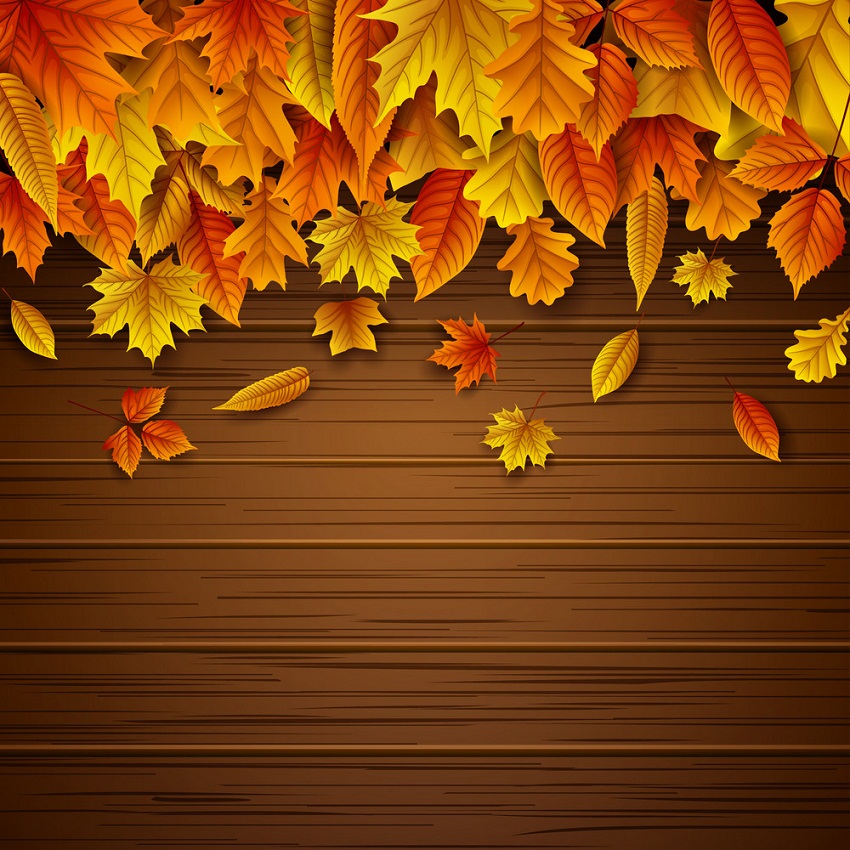 wooden background with fall leaves