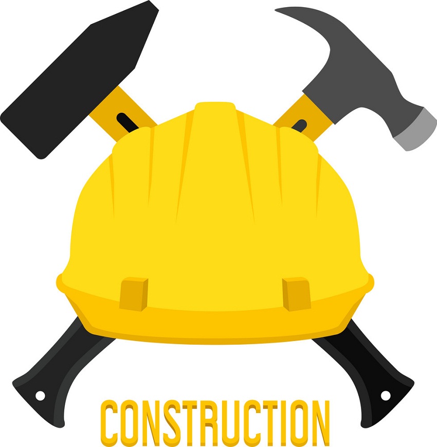 construction worker helmet and hammers