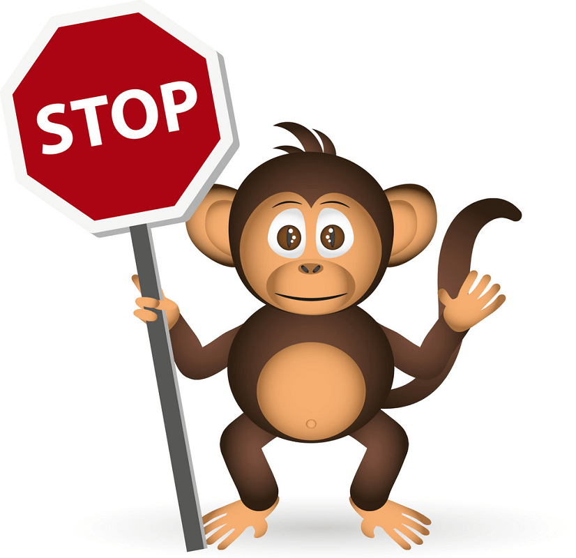Monkey holding Stop Sign clipart